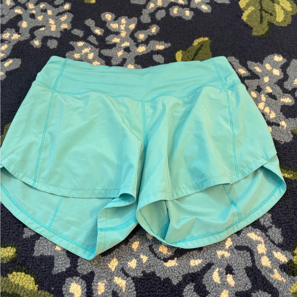 TEAL LULULEMON SPEED UPS INSEAM 4
